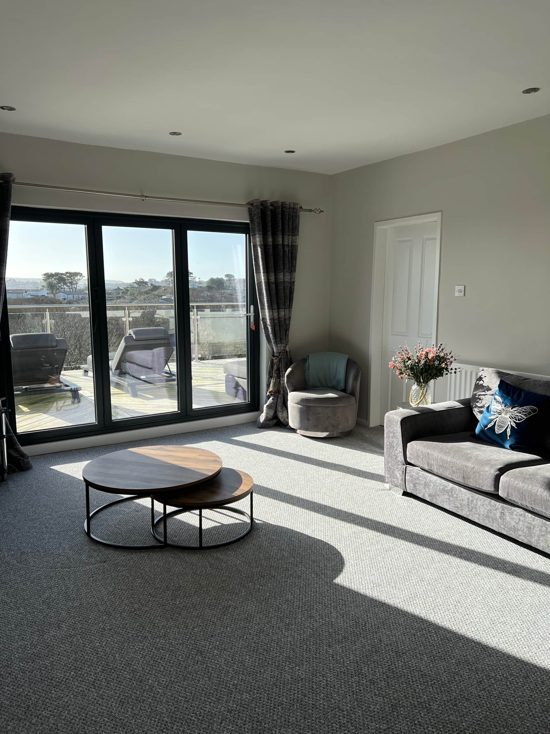 Bright living room with sea views